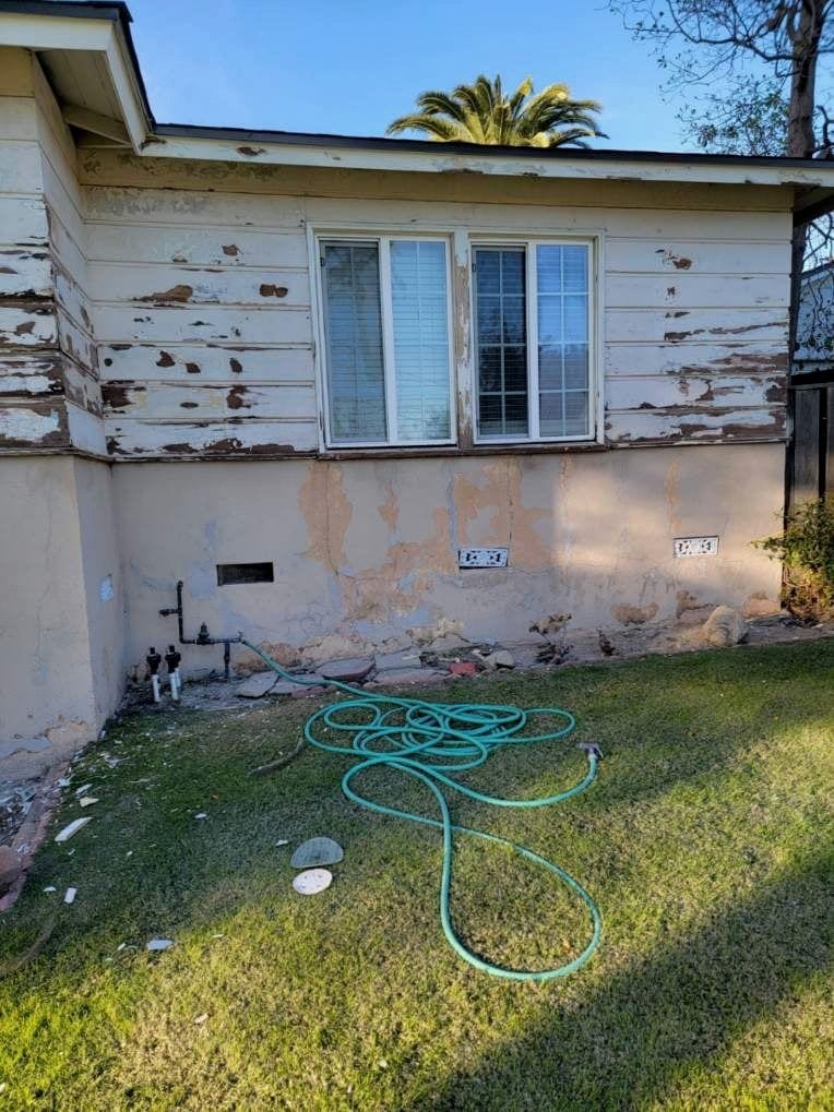 Peeling paint and damaged siding